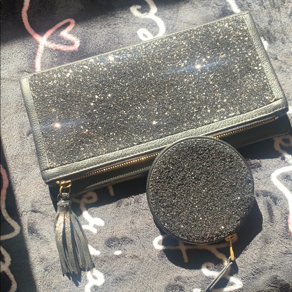 Fossil sparkle black cow hide clutch&change pocket